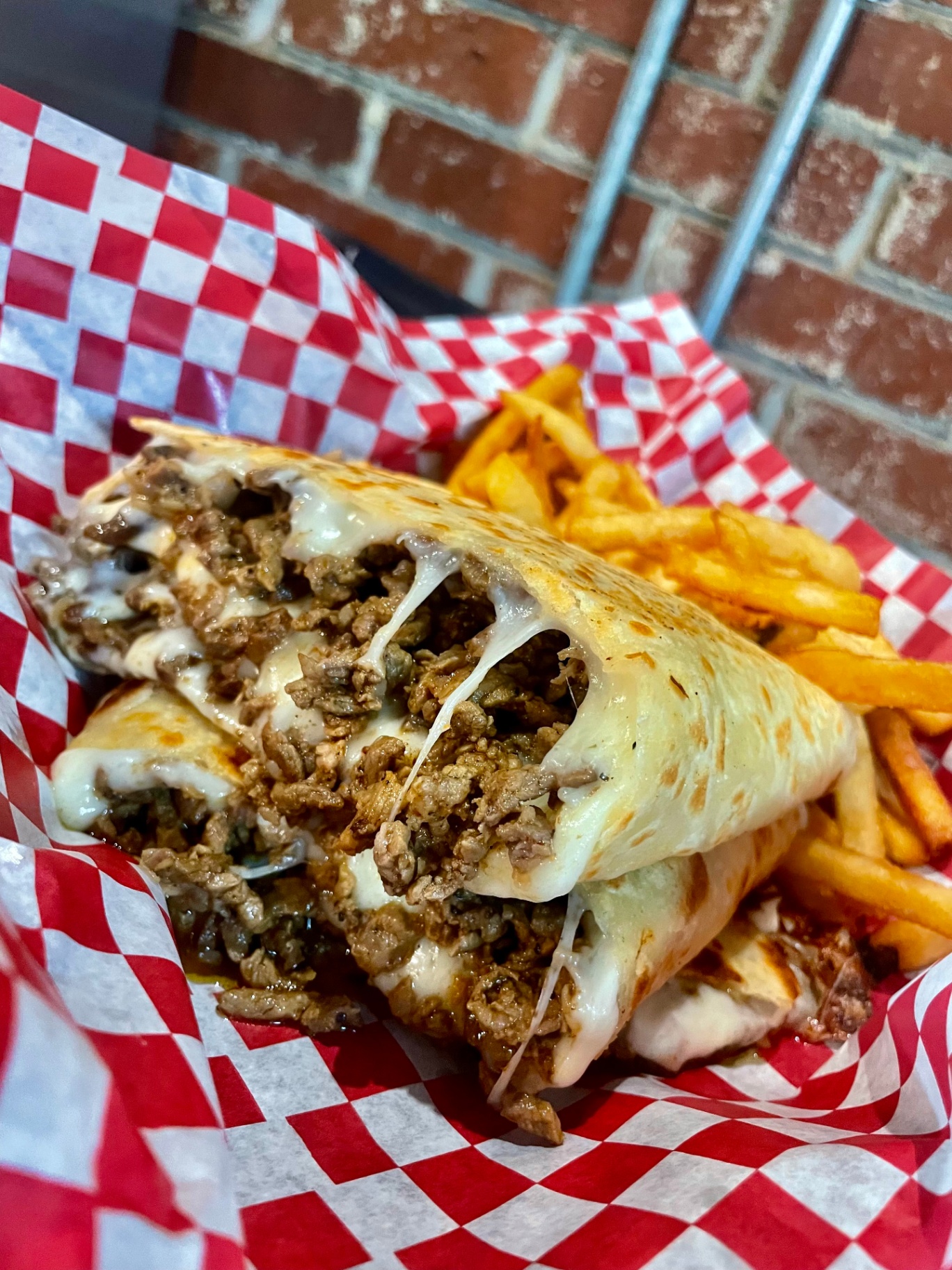 Cheesy steak quesadilla with crispy fries